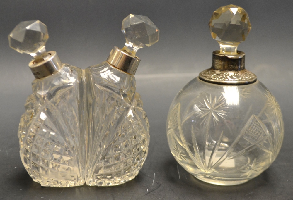Two cut glass scent bottles,