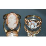 A 9ct gold opal seven stone floral cluster ring, open shoulders; a cameo ring,