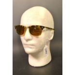 A pair of gentleman's Ray-Ban sunglasses, with lenses by Bausch & Lomb, faux tortoiseshell frames,