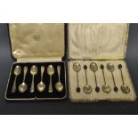 A set of six silver coffee spoons, rattail bowls, London 1935;  another set, bean terminals,