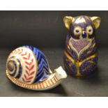 A Royal Crown Derby paperweight, Koala, gold stopper; another, Snail,