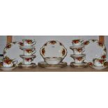 A Royal Albert Old Country Roses part dinner service including six dinner plates,