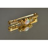 A diamond and opal bar brooch,