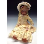 An early 20th century bisque head doll, by C M Bergmann, Walterhausen, Germany, blond wig,