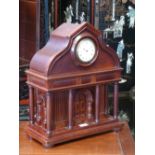 An unusual late 19th century architectural library clock,