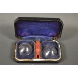 A pair of unusual early 20th century lenses, marked for the right and left eye,