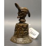 A 17th century style bronze table bell, crested by a bearded man wearing a bicorn hat,