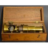 A mahogany cased brass microscope