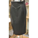 A Vivienne Westwood black leather skirt, size 14, with label marked Vivienne Westwood couture,