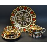 Royal Crown Derby 1128 Imari - a fluted dessert plate; a teacup and saucer; twin-handled sucrier,