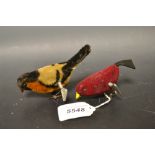 A Triang clockwork Pick-Pick bird, covered in red felt, black felt tail, 7cm long;  another,