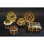 A Royal Crown Derby 1128 cigarette box (first quality); a lidded table lighter (first quality);