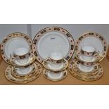 A Royal Crown Derby Border pattern six setting tea service including cups, saucers, side plates,