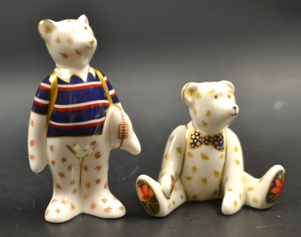 A Royal Crown Derby miniature Rugby Bear, first quality;  another, Edward Bear, second quality,