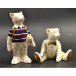 A Royal Crown Derby miniature Rugby Bear, first quality;  another, Edward Bear, second quality,