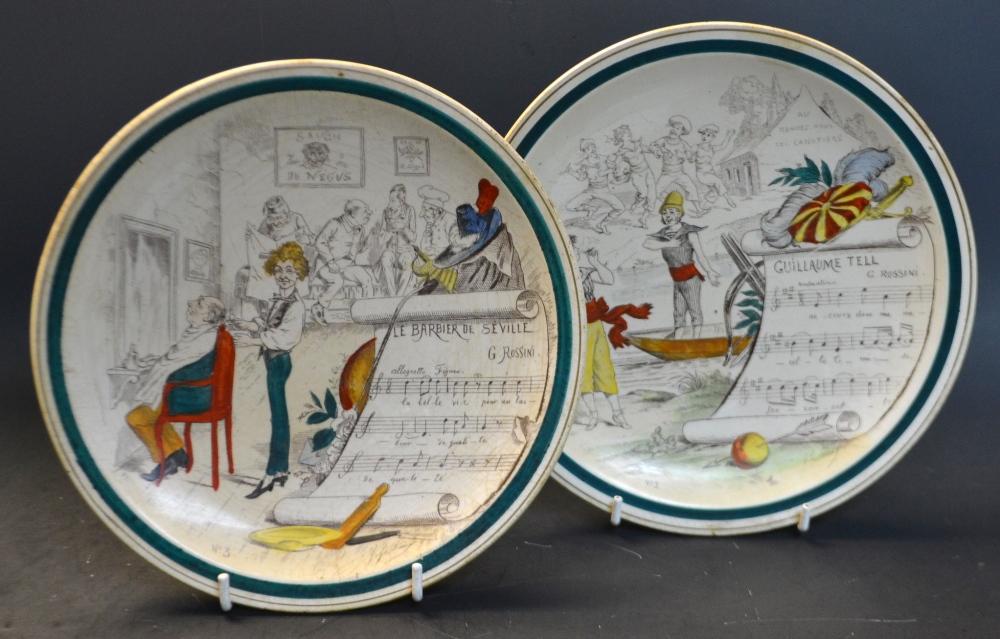 A pair of French Sujets Musicaux Terre De Fer plates,