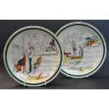 A pair of French Sujets Musicaux Terre De Fer plates,