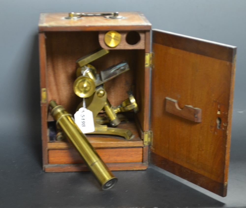 A 19th century lacquered brass monocular microscope, by J H Steward, 406 Strand, London,signed,