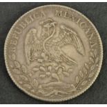 A Mexican 10D Libertad coin,