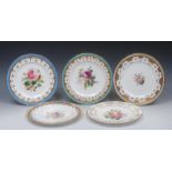 A pair of 19th century shaped circular plates, painted with roses and foliage,