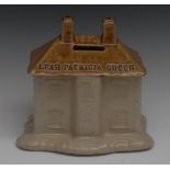 A 19th century Chesterfield brown salt glazed stoneware cottage money bank,