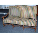An early 20th century mahogany framed sofa with Paul Smith fabric upholstery,padded back,