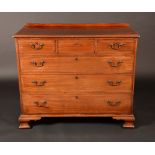An 19th century mahogany chest of drawers, galleried top, moulded edge,