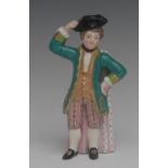 A rare Minton candle snuffer, modelled as a man dressed in regal ermine, a tricorn hat,