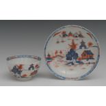 A Lowestoft Dolls House pattern tea bowl and saucer, painted in underglaze blue, iron red and gilt,