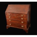 A George III oak bureau, crossbanded fall front enclosing fitted interior with pigeonholes,