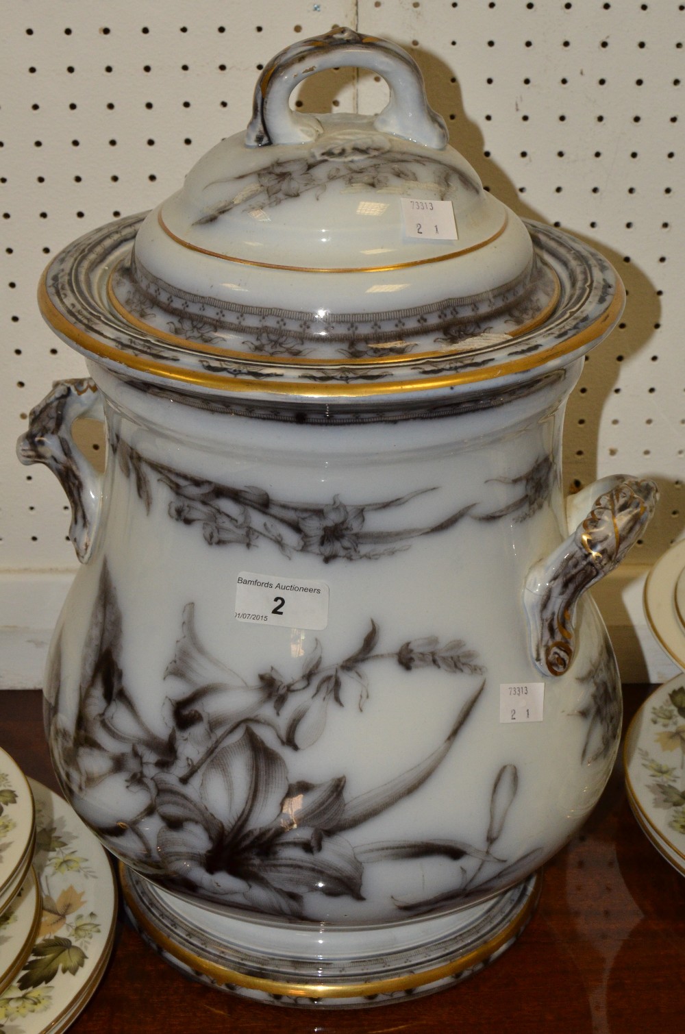 A Staffordshire Lily pattern flow blue water jar and cover, c.