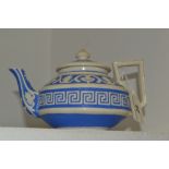 A William Brownfield relief moulded teapot, c.