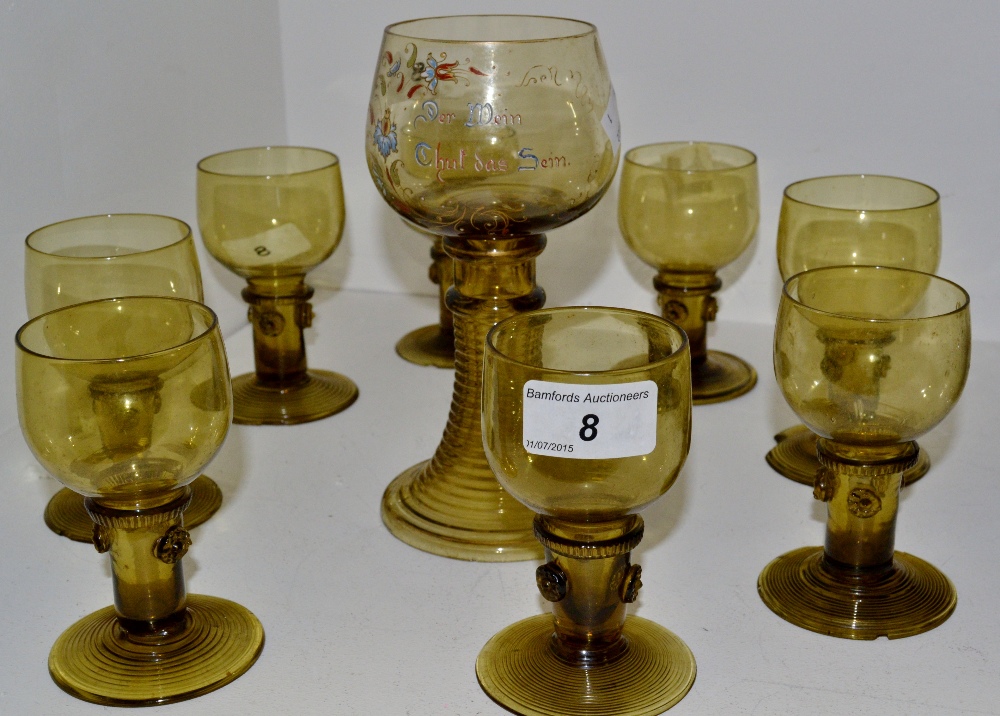 A German amber glass drinking suite,