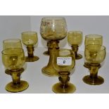 A German amber glass drinking suite,