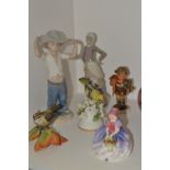 A Lladro Girl with milk pail, printed mark;  a Nao figure, of a boy wearing a hat;  a Hummel figure,