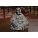Chinese School (19th/early 20th century), a dark patinated bronze, of Budai,