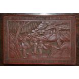 A Chinese cinnabar lacquer rectangular box and cover, carved with figures in a rocky landscape,