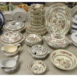 A Johnson Bros Indian Tree table service, comprising graduating covered tureens, sauce boat,