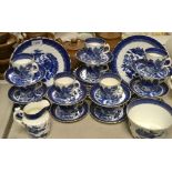 A Staffordshire blue and white oriental tea service, comprising two cake plates, twelve tea plates,