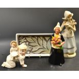 Ceramics - a Victorian continental porcelain figure children at play; a Dutch girl figure flask;