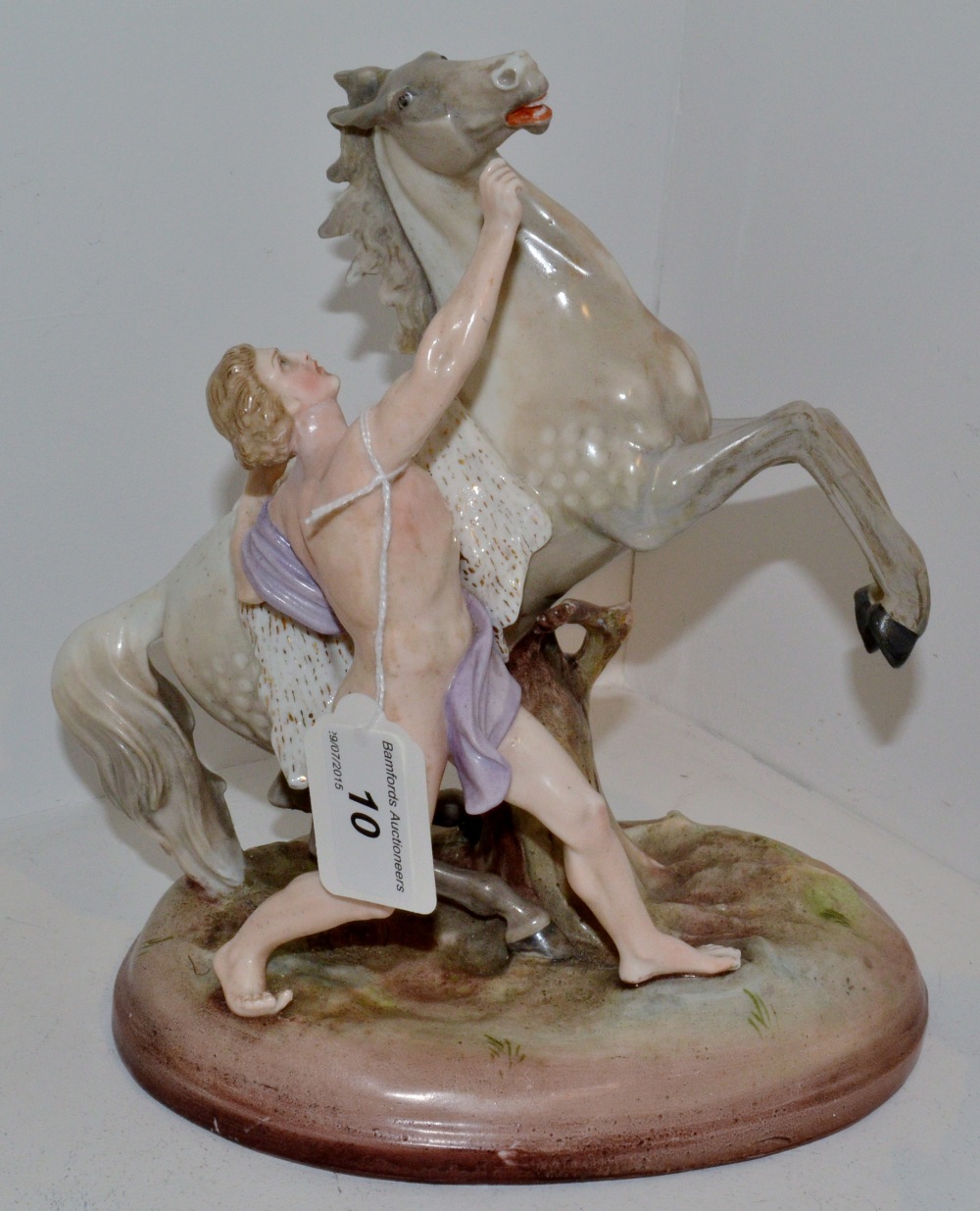 A German porcelain Marley horse type figure,