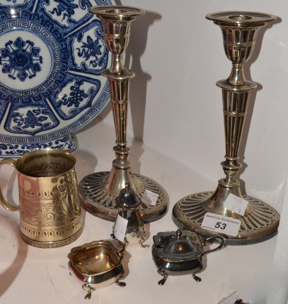 Metalware - a pair of Walker and Hall Sheffield silver plated candlesticks,