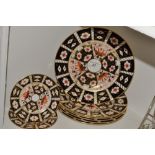 A set of five Royal Crown Derby 2451 pattern dinner plates, seconds;  another,