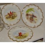 A pair of Royal Crown Derby Hunting wavy edge  dinner plates;  another, Fishing,