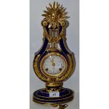 A porcelain mantel clock, The Marie Antoinette Clock,