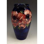 A Moorcroft Anemone pattern inverted baluster vase, tube lined with  large flowerheads,  18.