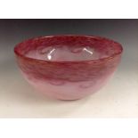 A Monart glass bowl, with aventurine inclusions, light and dark pink swirls, 20cm diam, c.