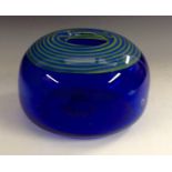 A studio glass compressed ovoid vase, blue glass cased in clear,