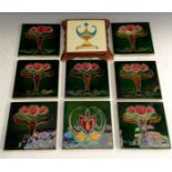 A set of eight Art Nouveau Majolica tiles,