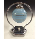 An Art Deco chrome and glass side light, light blue globular shade, chrome mount, hexagonal base,